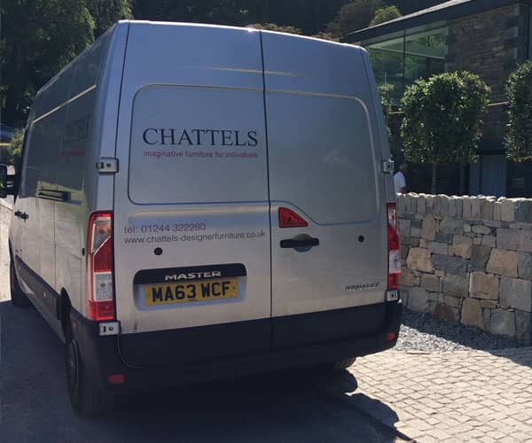 Chattels delivery van outside Chester property