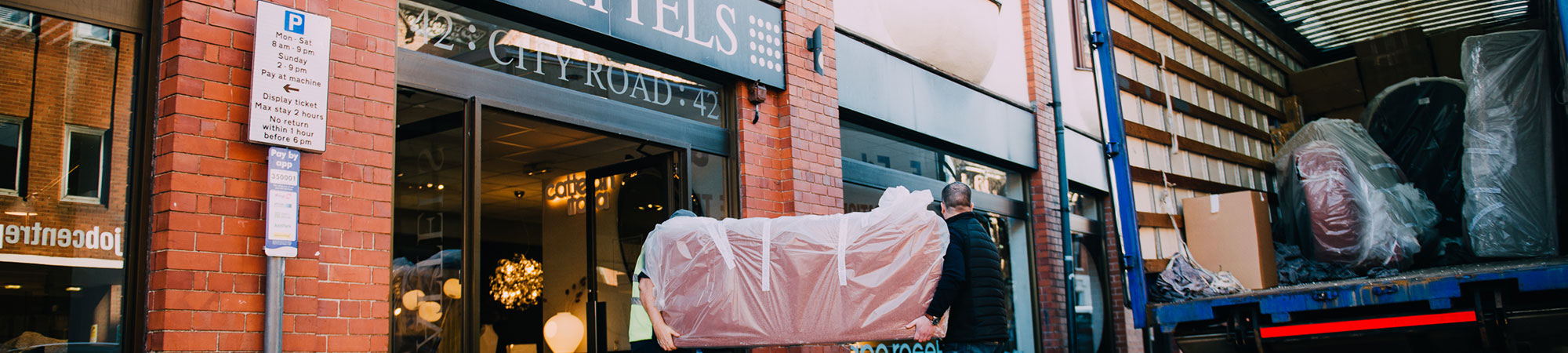 Chattels delivery van outside Chester property